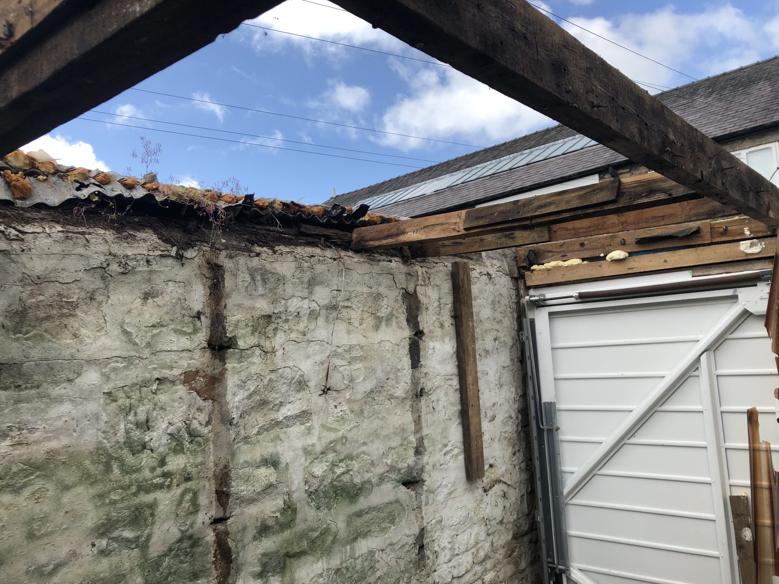 asbeostos garage roof removal