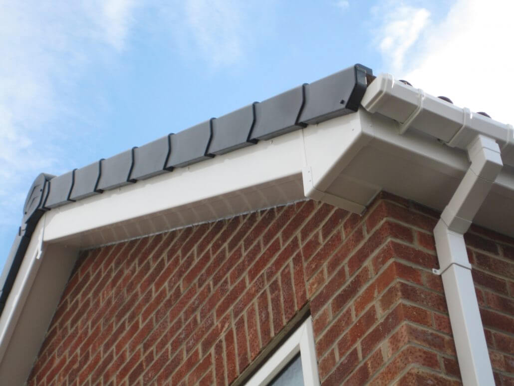 white fascia, soffits, guttering and dry verge caps installed