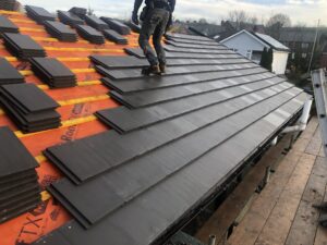 roof being tiled on a new roof installation lancaster